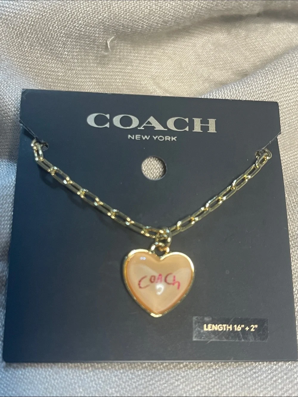 Coach Gold-Tone Chain Necklace with Pink Heart Pendant woman’s